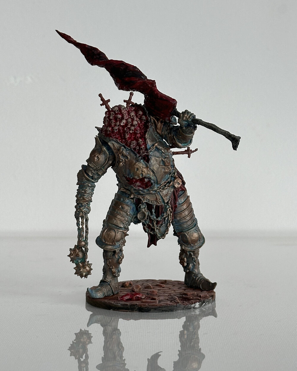 Painted miniature — armored figure with banner
